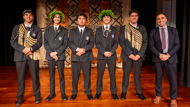 Students standing in the Senior Campus hall with Head of Senior Campus